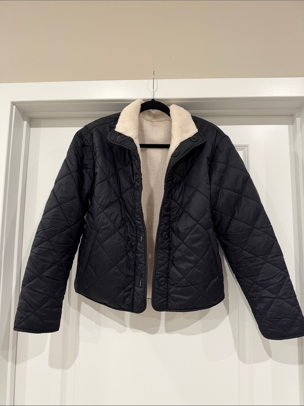 Reversible Black Quilted Jacket with Cream Sherpa Lining